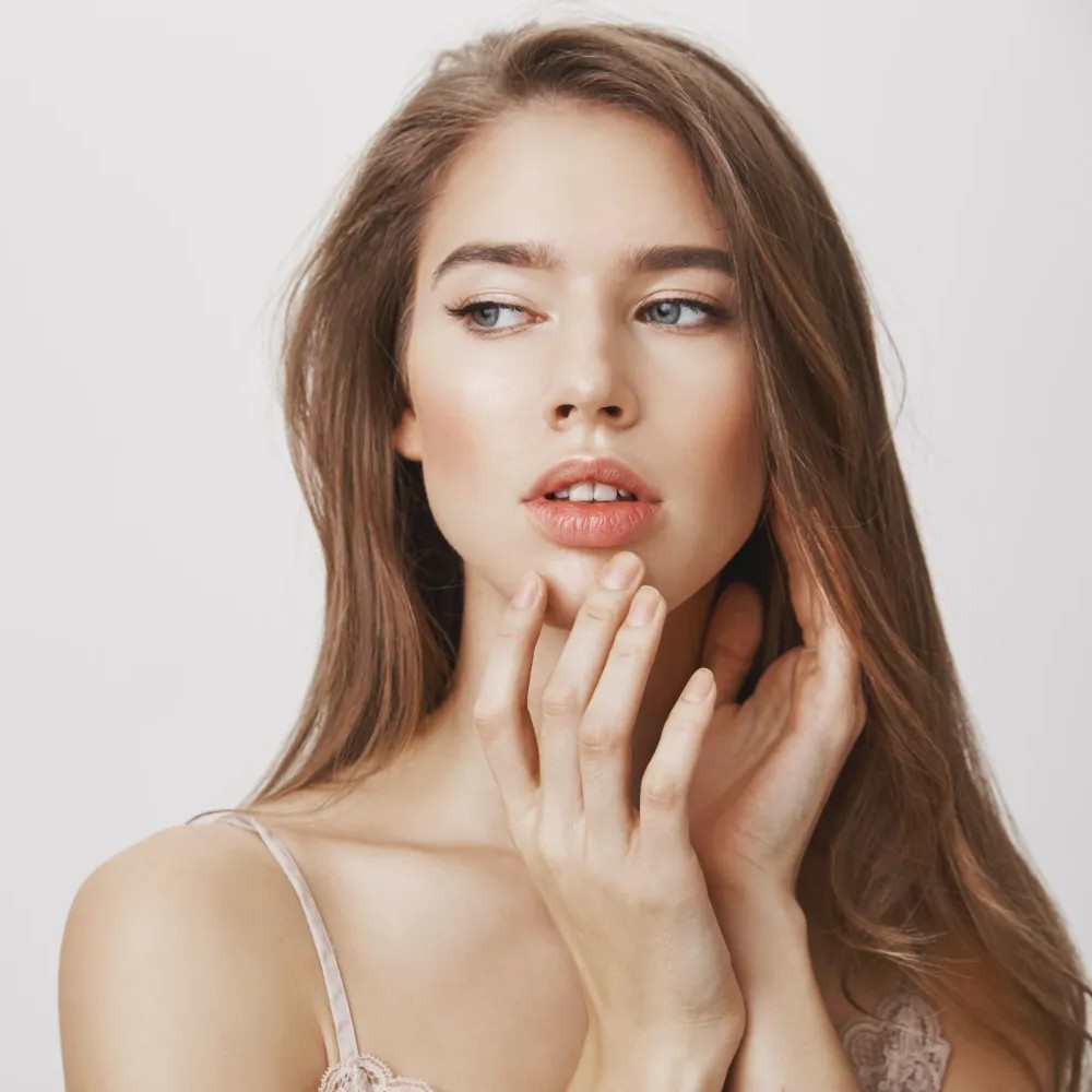 0.5ml lip filler treatments at a London clinic with subtle enhancement and a professional aesthetic setting.